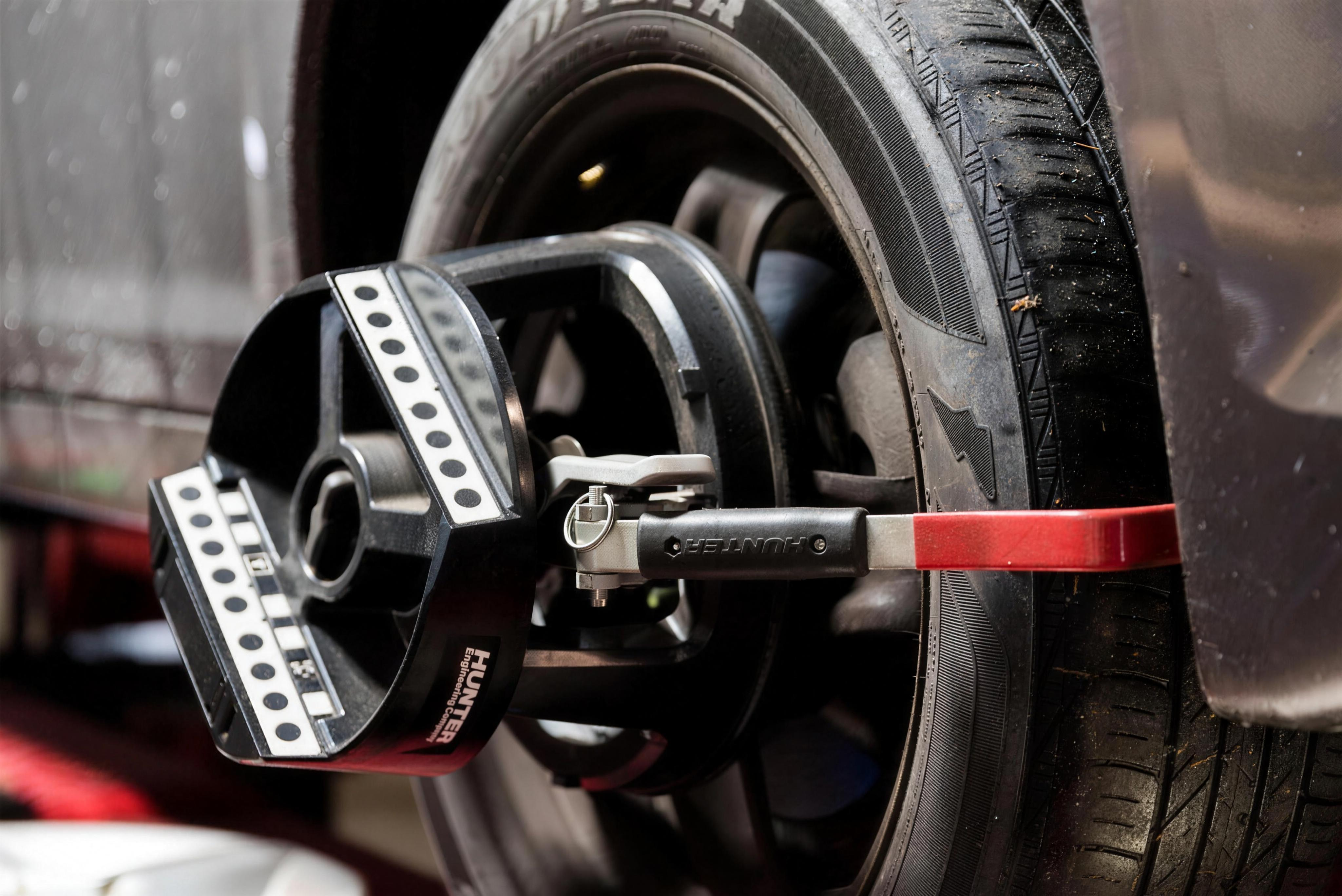 Hunter alignment equipment mounted on a wheel at Da-Val's Automotive